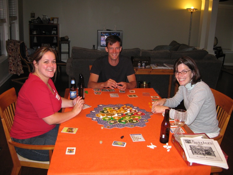 Bethany Nick and Erynn playing Settlers of Catan.JPG